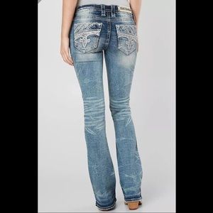 Low rise bootcut with embellished pockets